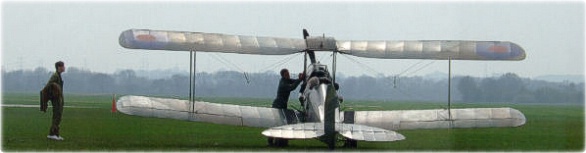 Tiger Moth following shower of rain, Sherburn Aero Club 2006